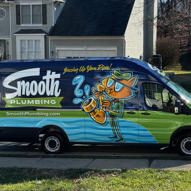 Smooth Plumbing Service Van Outside House